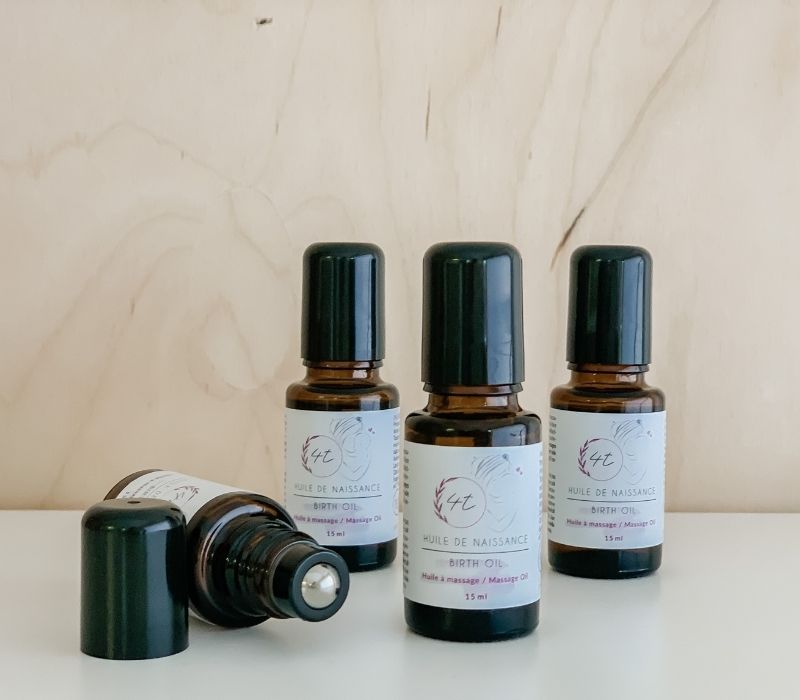 Huile de naissance pour massage points de pression pendant l&